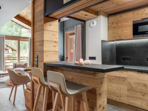 Appartement neuf près des pistes avec cheminée, proches commerces