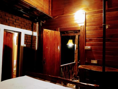Ένα ή περισσότερα κρεβάτια σε δωμάτιο στο Nera Nature House