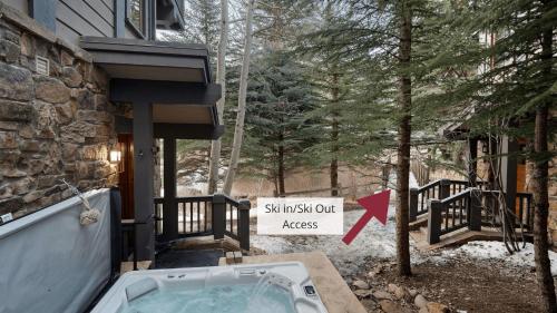 a hot tub outside of a house with a sign at 430 Cresta in Edwards