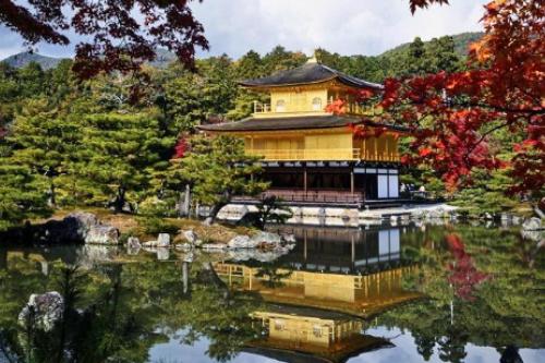 a chinese building on a pond in a garden at KYOTO R01 - 10 sec walk-Ryoanji Station in Kyoto
