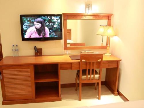a television sitting on a desk in a room at Au Lac 2 Hotel in Ho Chi Minh City