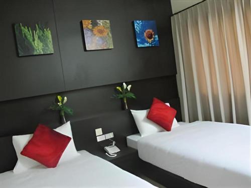 Postel nebo postele na pokoji v ubytování U Style Hotel