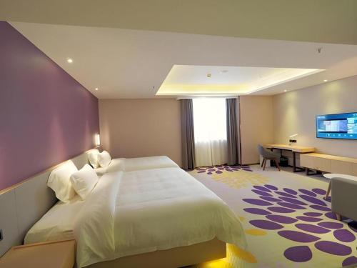 Katil atau katil-katil dalam bilik di PAI Hotel·Huazhou Bus Terminal