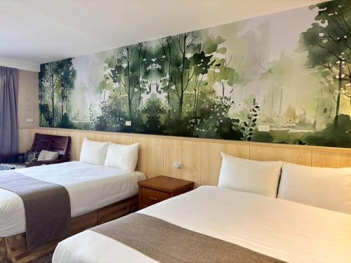 Cama o camas de una habitación en 大溪老城四季行館桃園市民宿058號