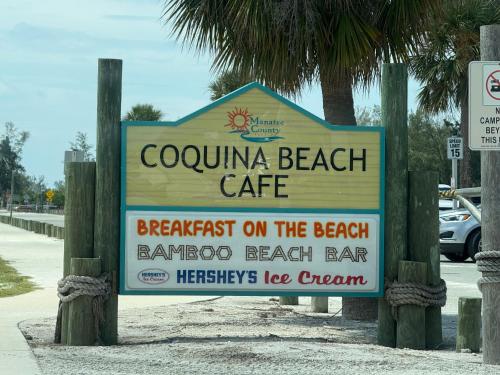 a sign for a beach cafe on the beach at Studio Yunet in Bradenton