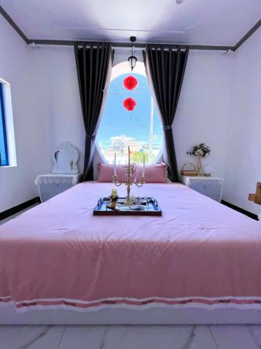 Ein Bett oder Betten in einem Zimmer der Unterkunft Hoàng Nga 1 Homestay