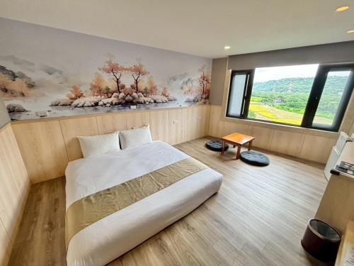 Cama o camas de una habitación en 大溪老城四季行館桃園市民宿058號
