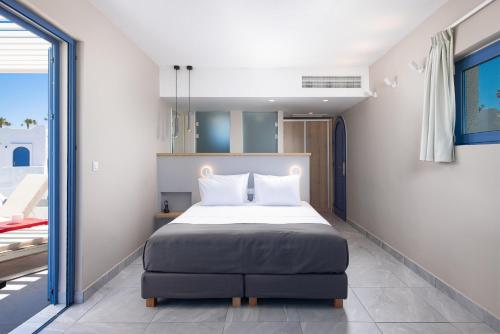 Katil atau katil-katil dalam bilik di The Aeolos Beach Hotel