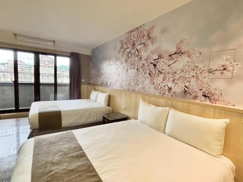 Cama o camas de una habitación en 大溪老城四季行館桃園市民宿058號