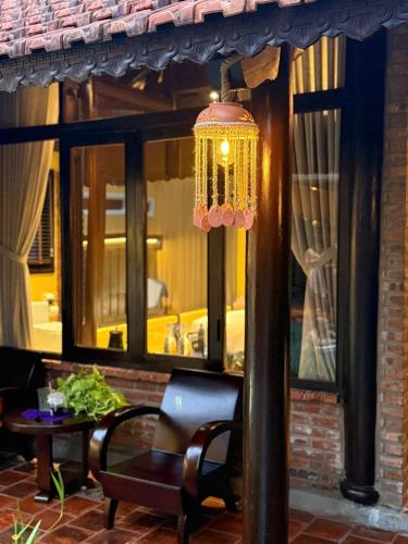 Zona de estar de DeMin Villa Hội An - Pool and BBQ Garden