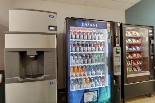 a vending machine filled with lots of bottles of soda at Best Western Liberty Inn DuPont JBLM in DuPont