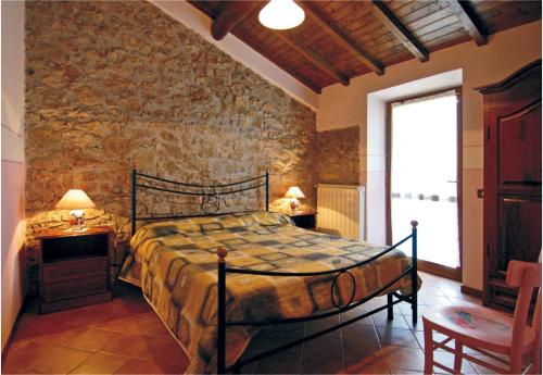 Tempat tidur dalam kamar di Agriturismo Summer