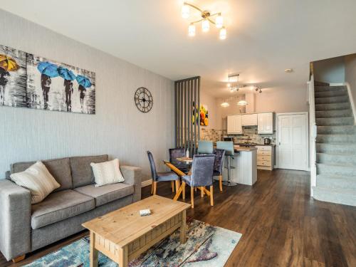 a living room with a couch and a table at Cottage 9 - Uk38220 in Ashby cum Fenby