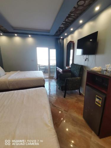 The Nile Palace Hotelにあるベッド