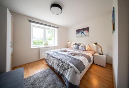 Ein Bett oder Betten in einem Zimmer der Unterkunft Veselíčko 44