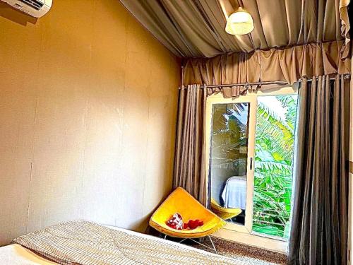 En eller flere senge i et værelse på Sonho do Moreno