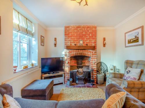 TV a/nebo společenská místnost v ubytování Rose Cottage