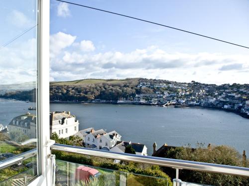 a view of a body of water from a window at Anchor Loft in Fowey