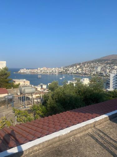a view of the ocean from a roof at Malaj's Rooms in Sarandë