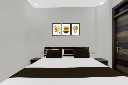 Katil atau katil-katil dalam bilik di HOTEL O Raghav Vaidehi Inn