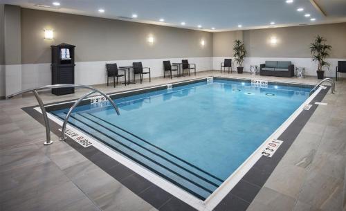 a large swimming pool in a hotel room at Homewood Suites By Hilton North Bay in North Bay