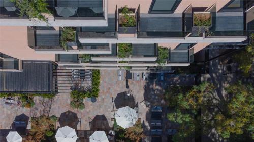 an overhead view of a building with reflections in the water at Hualta Hotel Mendoza, Curio Collection by Hilton in Mendoza