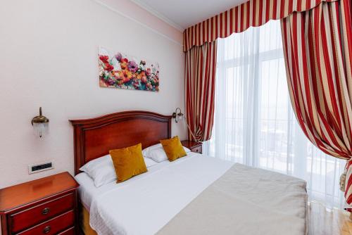 Cama o camas de una habitación en Hotel Savoy