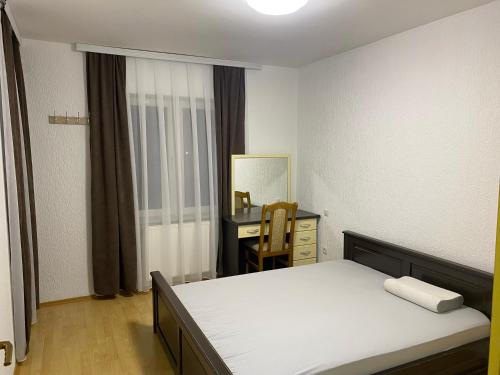 Ліжко або ліжка в номері Garden Apartment