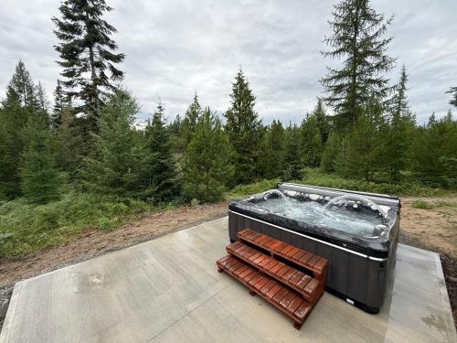 a hot tub sitting on the back at North Haven Campground in Bonners Ferry