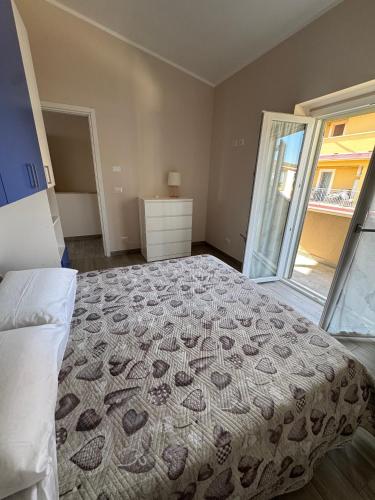 Postel nebo postele na pokoji v ubytování Casa vacanze La Fenice