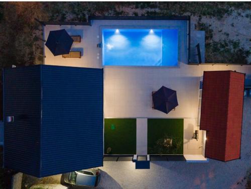 an overhead view of a room with umbrellas at Luxury Grey house in Stolac