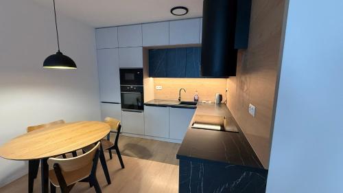 Kuchyň nebo kuchyňský kout v ubytování AMG apartment Halalovka