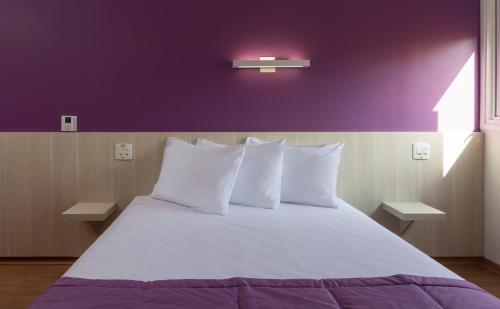 Cama o camas de una habitación en Go Inn Vitória