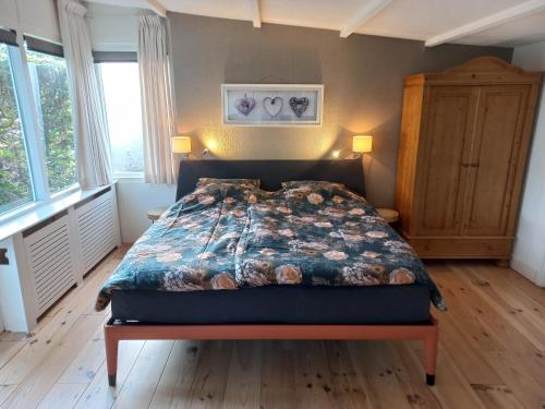 Postel nebo postele na pokoji v ubytování Bed and Breakfast Hattem