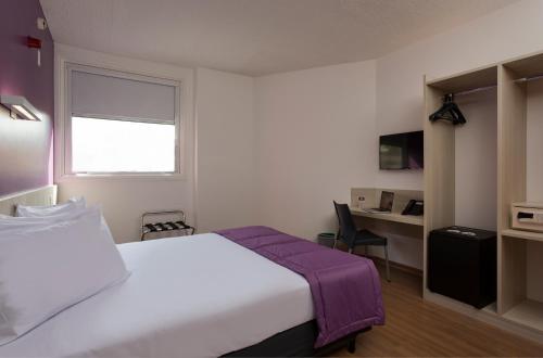 TV/trung tâm giải trí tại Go Inn Vitória