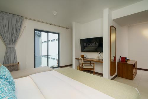 Barceló Nasandhura Maleにあるテレビまたはエンターテインメントセンター