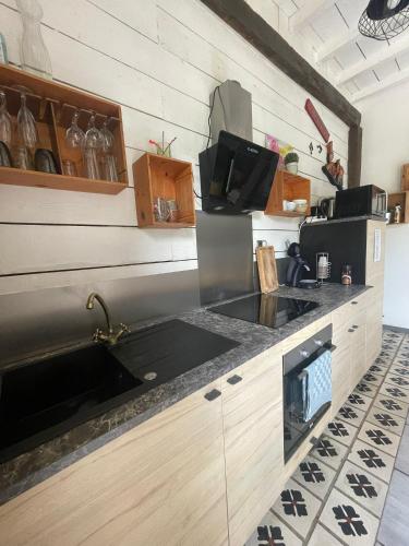 Una cocina o cocineta en gite Pedelucq