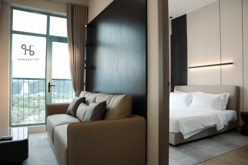 Katil atau katil-katil dalam bilik di Homesuite' Home at Bay Suites