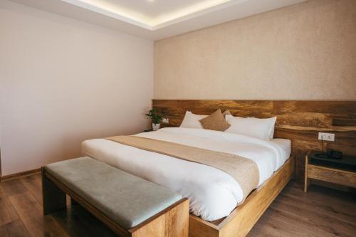 HOTEL BHRIKUTI TARAにあるベッド