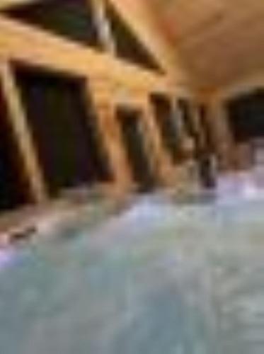 a blurry picture of a building with a building at Priv Hidden retreat ATV trails spa fishing outdoor activities in Jefferson