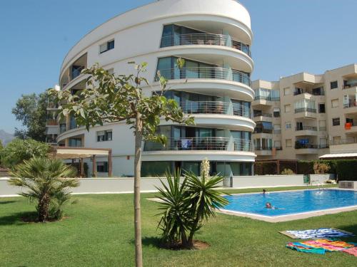 Appartement en front de mer à Roses avec piscine, climatisation et parking privé
