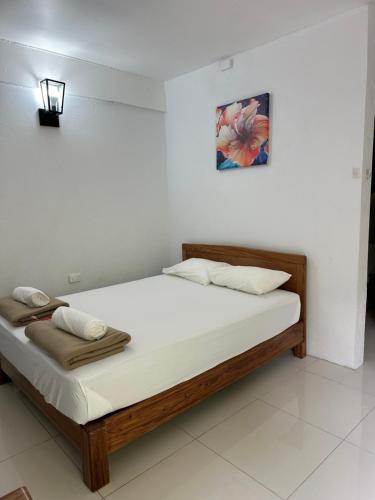 Postel nebo postele na pokoji v ubytování Waiview Apartment