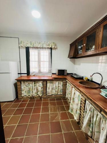 Kuchyň nebo kuchyňský kout v ubytování Hotel Humaina