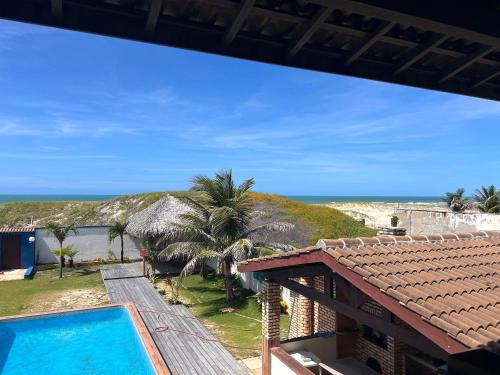 a view of the beach from the house at POUSADA Coisa Mais Linda e Massagem in Cascavel