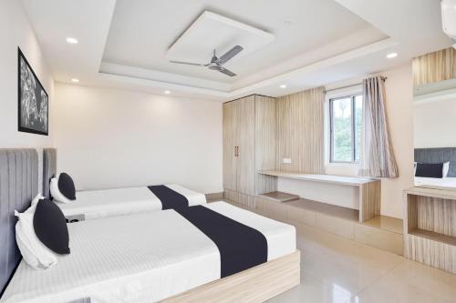 Ένα ή περισσότερα κρεβάτια σε δωμάτιο στο Hotel O Vira