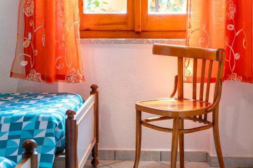 Postel nebo postele na pokoji v ubytování House Leoni