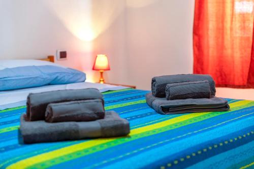 Postel nebo postele na pokoji v ubytování House Leoni