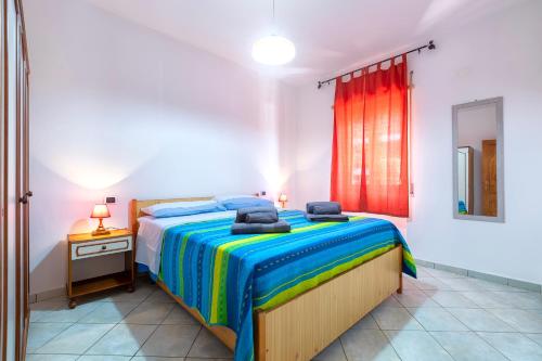 Postel nebo postele na pokoji v ubytování House Leoni