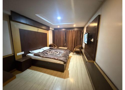 Letto o letti in una camera di Hotel Golden City