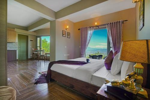 a bedroom with a large bed with a large window at SaffronStays Edelweiss Estate Amore in Chaubattia